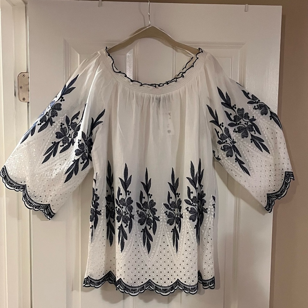 Blue and white 100% cotton light weight blouse with embroidery trim.